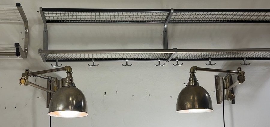 A pair of vintage brass foundry lamps, wall-mounted